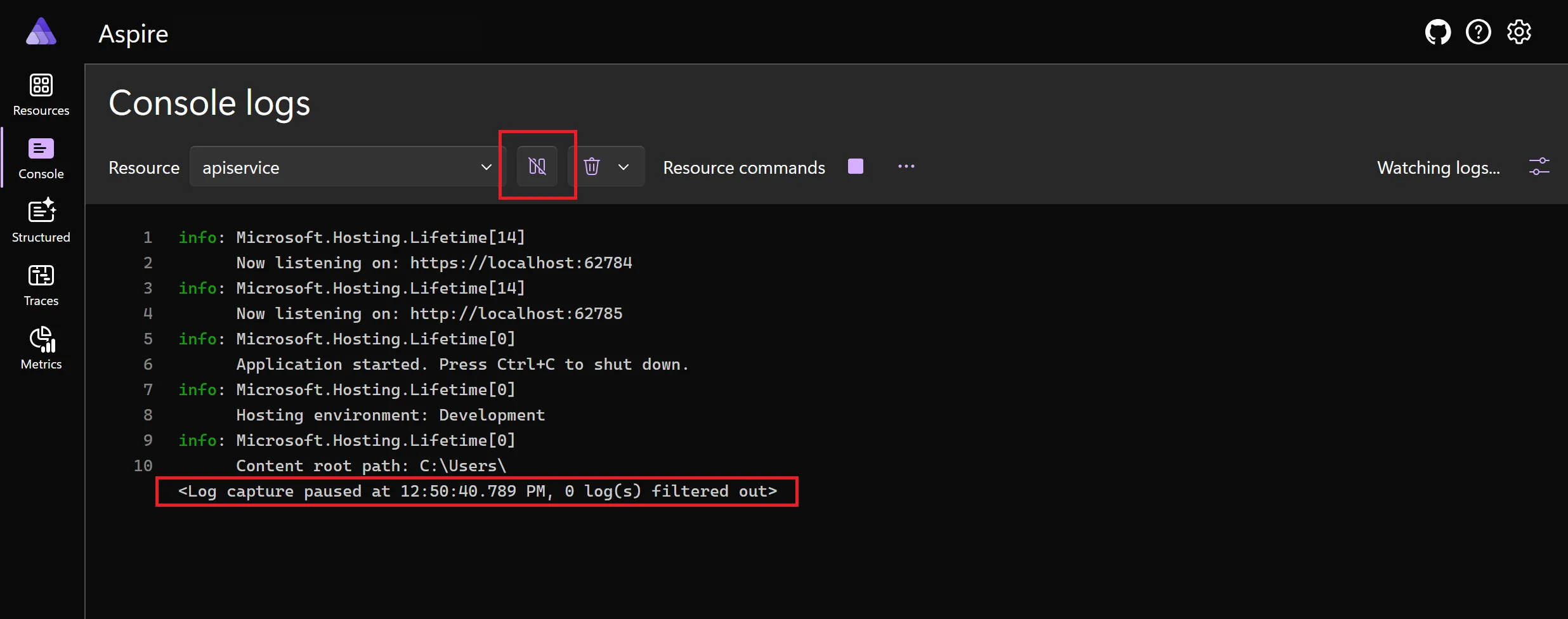 A screenshot of the Aspire dashboard Console logs page, showing how to pause telemetry.